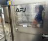 T�nel de resfriamento com cobrideira e tanque de derretimento de chocolates AFJ 2024