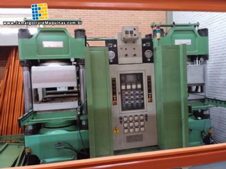 Prensa hidr�ulica dupla � v�cuo para vulcaniza��o de borracha Pan Stone